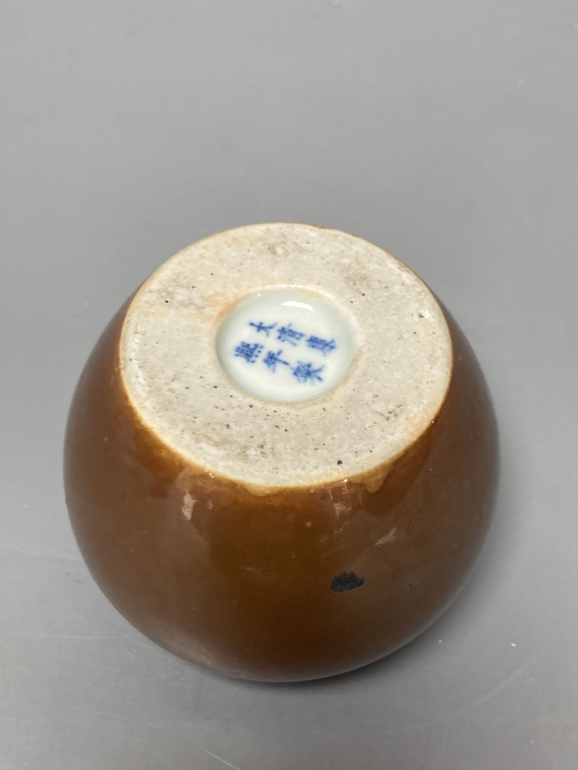 A Chinese cafe-au-lait glazed pot, Kangxi mark but later, height 7cm